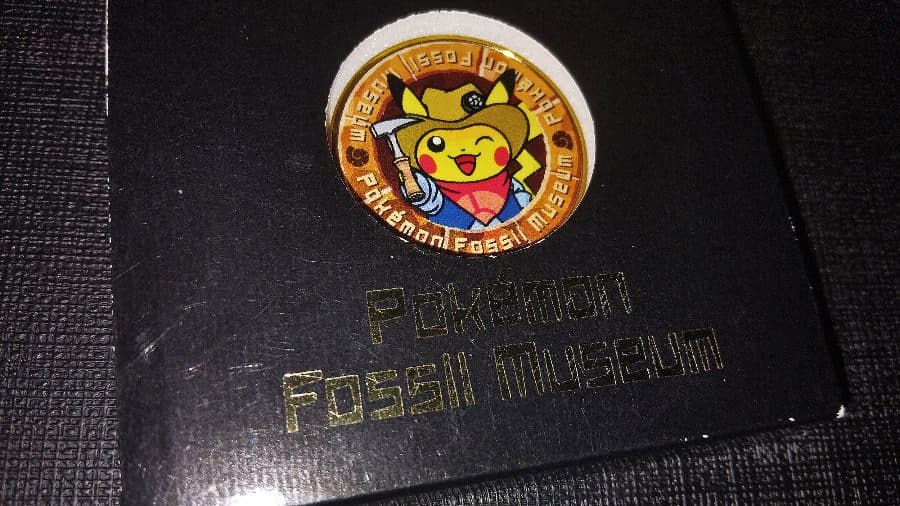 Official Pokemon Fossil Museum Excavator Pikachu Medal Commemorative Coin